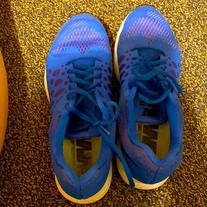 Blue Nike shoes. Size 10